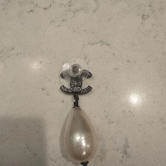 A beautiful pair of CHANEL dangle pearl earrings!